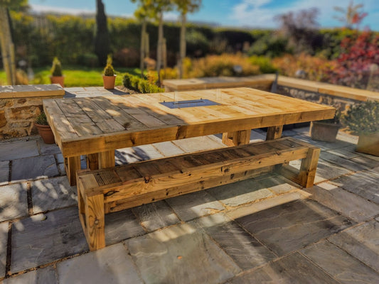 8ft x 4ft Solid wood dining table with matching benches and central firepit