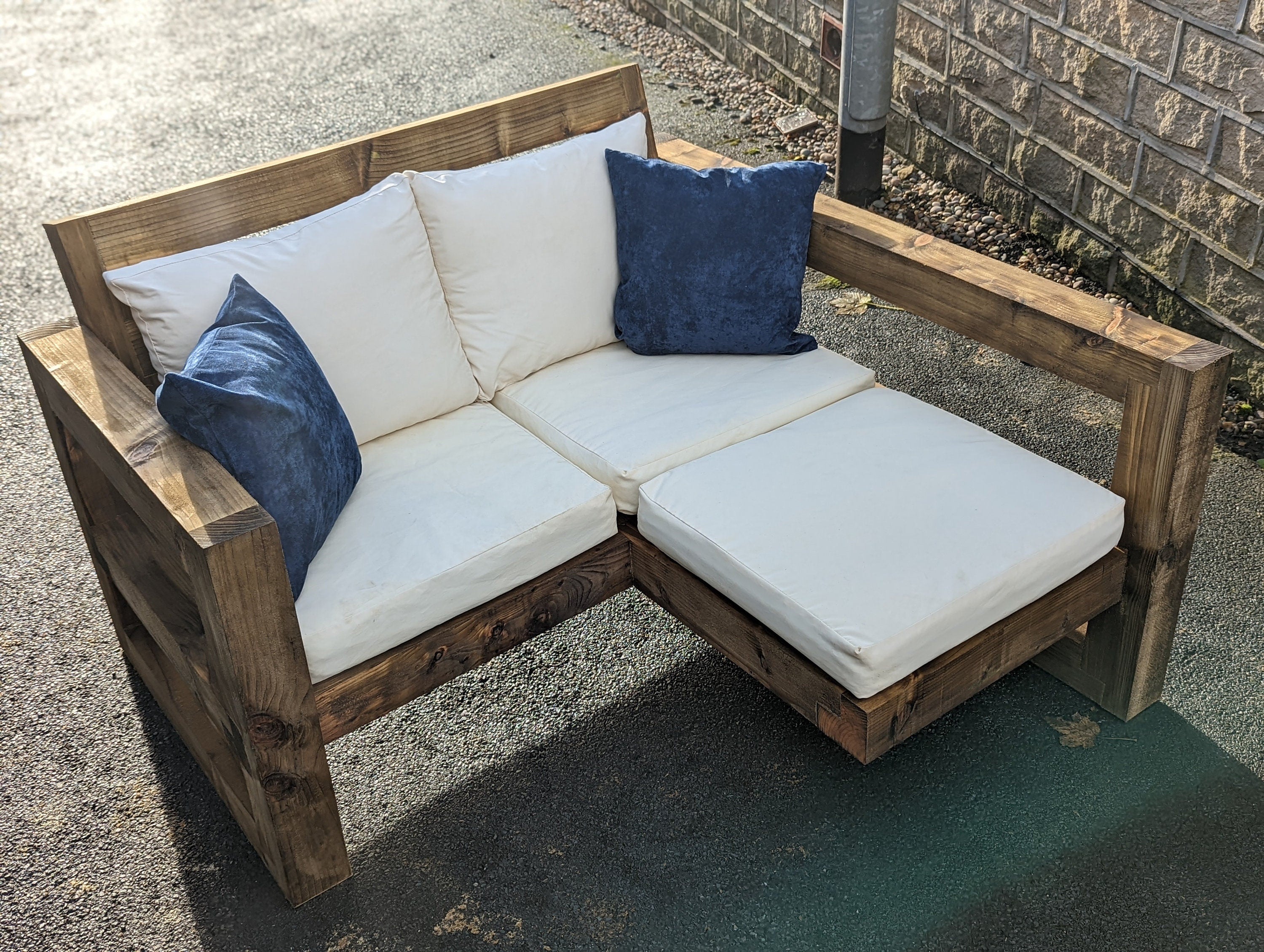 2 seater sofa with store leg rest